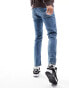 ASOS DESIGN slim jeans in flat mid wash blue