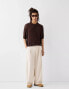 Bershka Collection wide tailored trouser in ecru