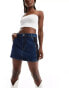 Фото #1 товара ASOS DESIGN denim mini skirt with contrast panels in blue and black