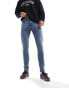 Фото #1 товара ASOS DESIGN skinny jeans in tinted light washed blue