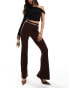 ASOS DESIGN rib slim flare trousers with back vent and gold belt in chocolate