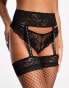 Ann Summers fishnet pull on suspenders set in black