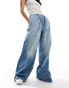 Фото #1 товара Weekday Mission denim wide leg joggers with seam detail in light blue wash