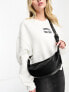 Фото #1 товара ASOS DESIGN sling crossbody bag in black