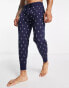 Фото #1 товара Polo Ralph Lauren lounge jogger in navy with all over print logo