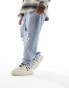 ASOS DESIGN baggy jeans with heavy rips in light wash blue