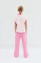 Wide-leg faded-effect jogging trousers