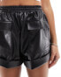 Фото #10 товара ASOS DESIGN leather look turn up utility shorts in black