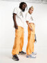 Фото #4 товара Weekday Unisex parachute baggy trousers in orange exclusive to ASOS