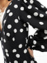 Wednesday's Girl polka dot v-neck jumpsuit in black