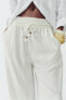Rustic trousers with elasticated waistband