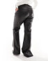 Vero Moda Curve leather look flared trousers in black