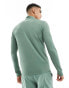 Puma Training Evolve 1/4 zip sweatshirt in light green