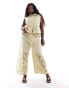 Фото #1 товара ASOS DESIGN Curve wide leg trouser with cutwork co-ord in khaki