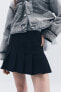 Short box pleat skirt