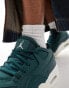 Air Jordan 4 RM trainers in off white and green