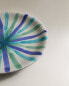 Dessert plate with blue stripes