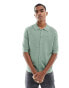 Фото #1 товара GANT button through textured cotton knit polo shirt in light green