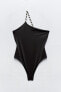 Asymmetric swimsuit with rope