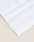Extra soft towel with double border