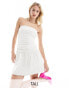 Фото #1 товара Extro & Vert Tall bandeau flippy mini dress in white