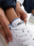 ellesse Panaro cupsole trainers in white and blue