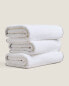 Cotton towel with overlock