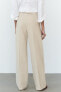 Rustic high-waist trousers