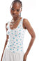 Monki pointelle scoop neck vest top with lace trim in off white and blue floral print