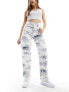 Фото #1 товара Levi's Ribcage straight fit ankle jeans in white with navy print