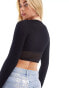 Miss Selfridge seamless long sleeve crop top with mesh corset panel in black