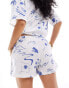 Iisla & Bird printed beach short co-ord in white and blue