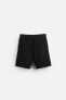 CREASED-EFFECT BERMUDA SHORTS