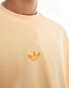 adidas Originals oversized t-shirt with central logo in pastel orange