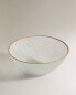 Raised glass bowl with gold rim