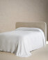 Ruffled muslin bedspread