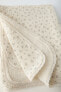 Floral cotton blanket with lace trim