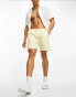 Weekday Ed contrast stitch swim shorts in light yellow