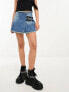 Tammy Girl mid rise distressed denim mini skirt with buckle details