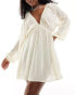 Фото #2 товара ASOS DESIGN plunge long sleeve sheer mini beach dress with metallic stripes in cream