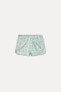 FIGURATIVE PRINT SHORTS