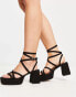 ASOS DESIGN – Hutton – Riemchen-Plateausandalen in Schwarz mit Absatz, weite Passform