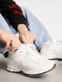 New Balance 2002 trainers in off-white
