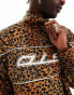 COLLUSION Animal print half zip tech fleece with print