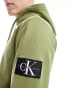 Calvin Klein Jeans badge hoodie in juniper