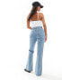 Фото #7 товара ASOS DESIGN Petite mid rise flare jeans in light blue