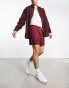 ASOS DESIGN oversized shorts in burgundy sporty mesh