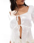 ASOS DESIGN Petite lace trim tie front satin babydoll top in white