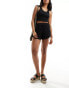 Фото #2 товара ASOS DESIGN textured tie side high low shorts in black