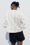 Blouse with cutwork embroidery